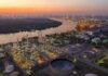 Diesel Gets Priority In G7 Fuel Plan Industrial oil refinery complex beside a river at dusk