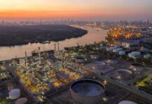 Diesel Gets Priority In G7 Fuel Plan Industrial oil refinery complex beside a river at dusk