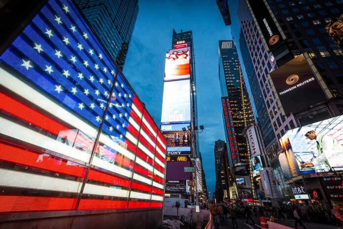 American flag LED display in Times Square at dusk
