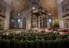 Vatican Shock: Pope Heads Into Surgery Jonathan Cyprien among clergy during a mass in a grand cathedral interior