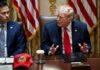 Trump Hands AI To America’s Spy Chief Donald Trump speaks at a meeting table beside Marco Rubio
