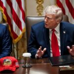 Trump Hands AI To America’s Spy Chief Donald Trump speaks at a meeting table beside Marco Rubio