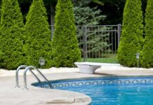 Drowning Timeline Explodes Into Court Fight Outdoor swimming pool with curved edge and diving board